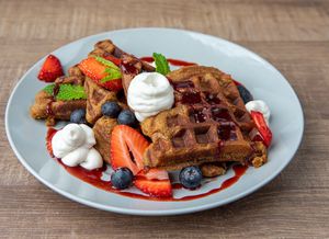 Gluten free + Vegan waffles from the all day breakfast¨ menu. Flavor may vary. at Manna Life Food in Miami