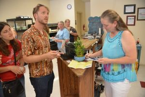 Chris Sauve (R) is the hard working owner of Munch On and Beyond at Munch On and Beyond in San Antonio