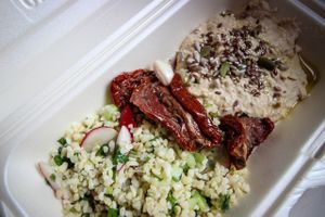 tabouleh with hummus and dried tomatoes at Manna Manna in Brasov