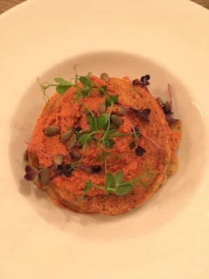 Chickpea pancakes with roasted pepper spread at Manna Manna in Brasov