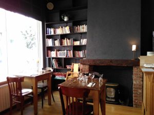 they have books and boardgames! at Les 4 Jeudis in Brussels