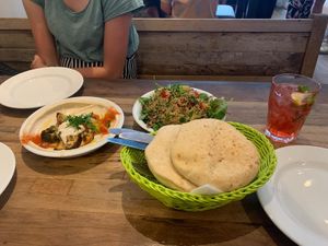 Hummus with antipasti, pita and quinoa salad  at Hummus & Friends in Berlin