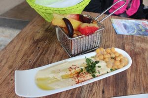 Homemade hummus with grilled vegetables at Hummus & Friends in Berlin