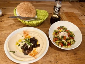 Hummus with mushrooms & israeli salad  at Hummus & Friends in Berlin