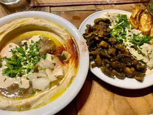 Hummus with ful and mushrooms with baba ghanoush at Hummus & Friends in Berlin