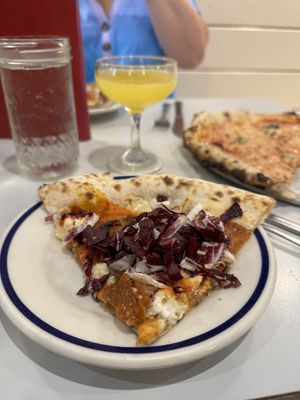 Te Kā - 22 (v+, n)
spicy vodka sauce, numu mozz, cashew ricotta, peppadews, caramelized onion, be-hive pepperoni, mellody hot honey, radicchio, oregano, lemon  at Talula's Pizza in Asbury Park