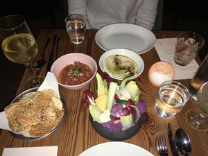 House-made hummus and smoked tomato dips with veg scoops and mini papadum discs...great cocktails and wine list at Nix in New York City
