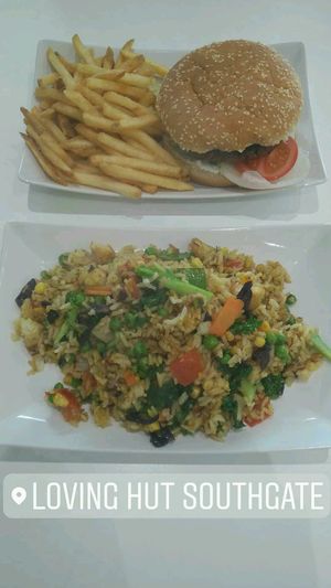 Beet & quinoa burger with chips and Chef's special fried rice with tofu and vegetables at Loving Hut - Southgate in Crawley