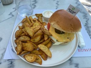 The Beyond Meat burger with vegan mayonnaise. Also received a lot of very tasty potatoes on the side.   at Distrato Cafe in Paros