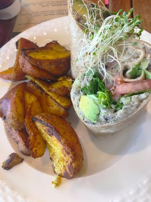 White bean “no tuna” wrap with roasted potatoes at Holi Vegan Kitchen in North Miami Beach