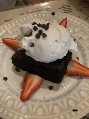 Brownie with ice cream  at Holi Vegan Kitchen in North Miami Beach