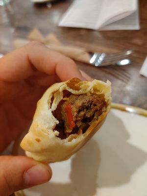 Impossible empanadas. Really good. Totally recommend this. at Holi Vegan Kitchen in North Miami Beach