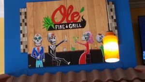 restaurant logo and decor at Ole Fire Grill  in Melbourne