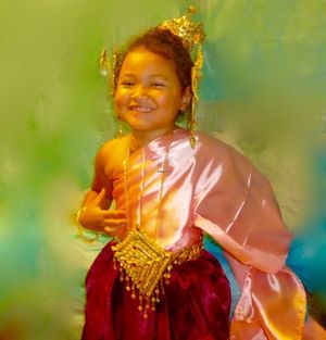 May Kaidee and Parn from Bangkok sent the traditional Thai costume to Emma at the May Kaidee location in Phnom Penh.  She loved it. Thanks. at May Kaidee's Vegetarian Restaurant in Phnom Penh