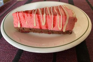 Strawberry mousse cake with white chocolate garnish  at Wani Vegan Bakery in Rome