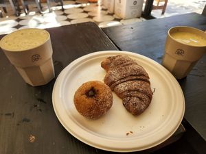 Chocolate croissant, a chocolate stuffed donut, smoothies at Wani Vegan Bakery in Rome