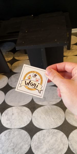 Wani's logo at Wani Vegan Bakery in Rome