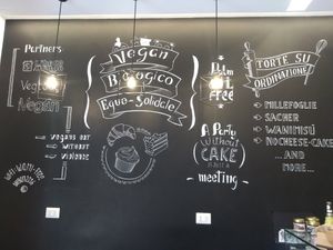 Their left wall at Wani Vegan Bakery in Rome