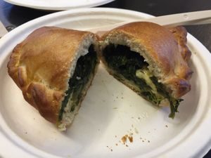 Panzerotto with spinach and vegan cheese: the filling  at Wani Vegan Bakery in Rome