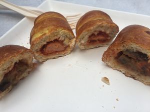 Vegan panzarotto (with aubergines and vegan cheese), vegan hotdog with vegan wurstel, vegan cheese, ketchup at Wani Vegan Bakery in Rome