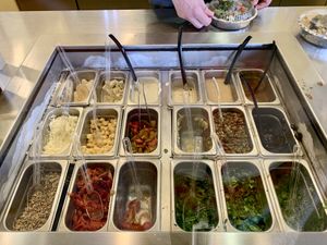 Choose your toppings at Ciao Italian Grill  in Oxnard