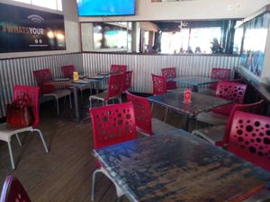 Seating area downstairs at Umbrellas Beach Bar in St Georges