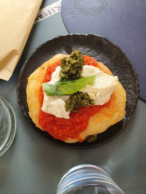 Fried pizza at Black Sheep Raw • Vegan Lab & Bistrot in Trento