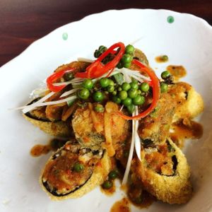 Deep-fried seaweed rolls w/ scramble tofu in red curry sauce at Pi Vegetarian Bistro in Ho Chi Minh City