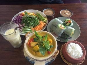 Curry, summer rolls, and a bowl  at Pi Vegetarian Bistro in Ho Chi Minh City