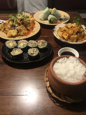 Summer rolls, maki, cauliflower in sesame sauce, tofu with lemongrass and chilli and a side of rice at Pi Vegetarian Bistro in Ho Chi Minh City