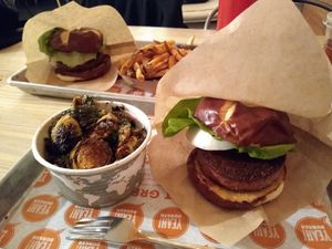 Beyond Burgers with Vegan Pretzel Buns. Sides of fries and Brussels Sprouts (without goat cheese). at Yeah Burger - Howell Mill Rd in Atlanta