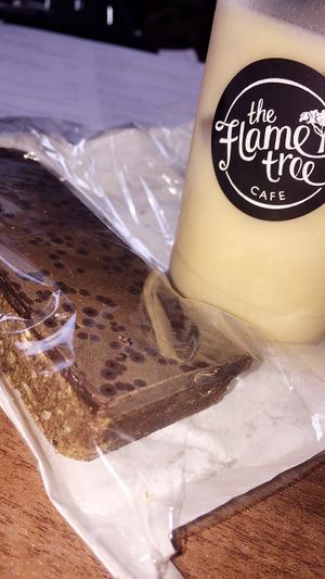 chocolate biscuit and chai iced latte  at The Flame Tree Cafe in Dundee