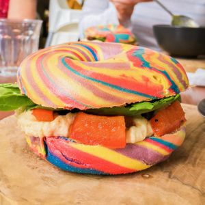 rainbow bagel with hummus, spinach and roasted veg at The Flame Tree Cafe in Dundee