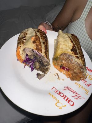 Chorizo burrito (right) and potato-garlic burrito   at Veguisima in Mexico City