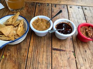 Complementary chips with different salsas  at Veguisima in Mexico City