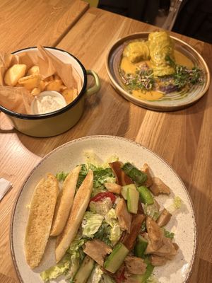 Cabbage Rolls (furthest) Crispers fries and Vegan Cezer Salad (closest)  at Veganic in Krakow