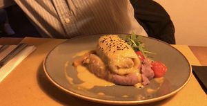 Stuffed cabbage leaves with red rice and truffle rice at Veganic in Krakow