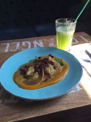 Mushroom ravioli and pear cucumber celeriac juice  at Veganic in Krakow