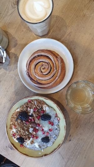 Vegan cinnamon roll / vegan chia pudding at Le Pain Quotidien - Exhibition Rd in South West London