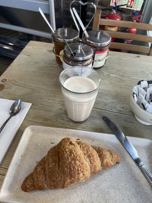 vegan croissant, chai latte with oat milk and jam and choclate cream  at Le Pain Quotidien - Exhibition Rd in South West London