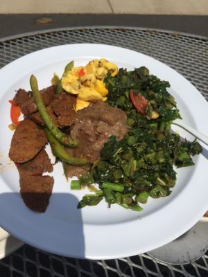 Sausage Seitan and peppers, steamed Greens, African Potatoes at Fire & Spice Vegan Restaurant - Capitol Ave in Hartford
