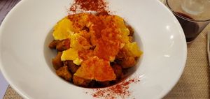 Savory bread pudding with figs and orange. at El Fogon Verde in Madrid