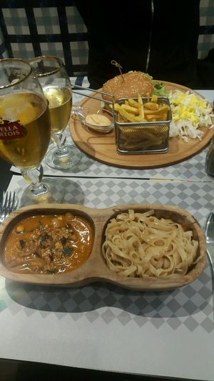 burger with fries and noodles at Veggies in Tirana