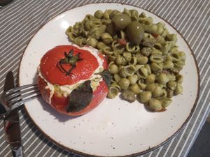 Pesto Risotto stuffed tomato with cheese
 at Savor Living in Oakville