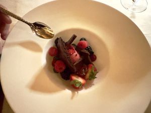 Dessert: I believe they called this “chocolate bubbles”. Raspberry sorbet, fresh berries, house-made aerated chocolate. Absolutely delicious .  at The Pointe Restaurant in Tofino