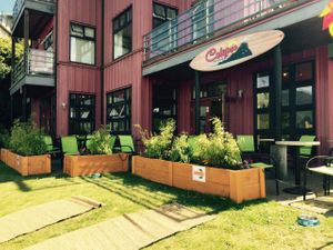 Outdoor patio at Calypso Roti Shop in Tofino