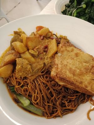 Wantan mee with 'mutton' curry and fried tofu skin. Staff assured that no eggs were used in the noodles and no dairy in the curry. at My Real Cafe in Petaling Jaya