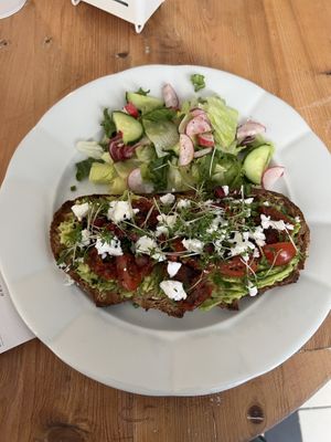 Avocado toast with vegan cheese and sun dried tomatoes   at Veget in Prague