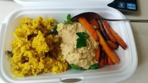 Vegan Bowl, which I´ve taken away to work, but still it was delicious. 
Curry cauliflower rice, hummus and glazed carrot with coriander. 
In general very cory bistro, everyday has a vegan option for lunch and also a soup are vegan, but for sure ask them. 
The crew there is very friendly and nice. 
They also have a vegan desserts in daily offer.
You can pay by credit card or cash.  at Veget in Prague