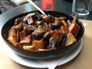 Potato wedges with mushroom and ketchup  at Mayka in Belgrade